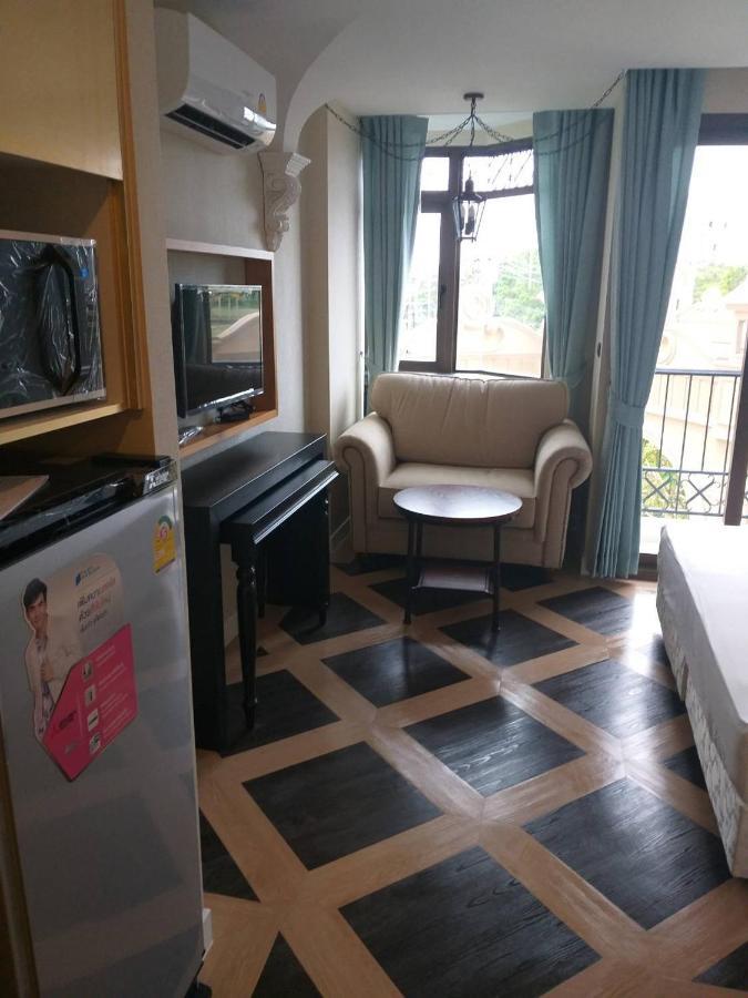 Espana Condo Resort Джомтьен Экстерьер фото